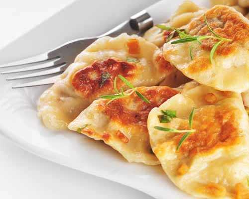 Pieczone pierożki z kapustą i grzybami